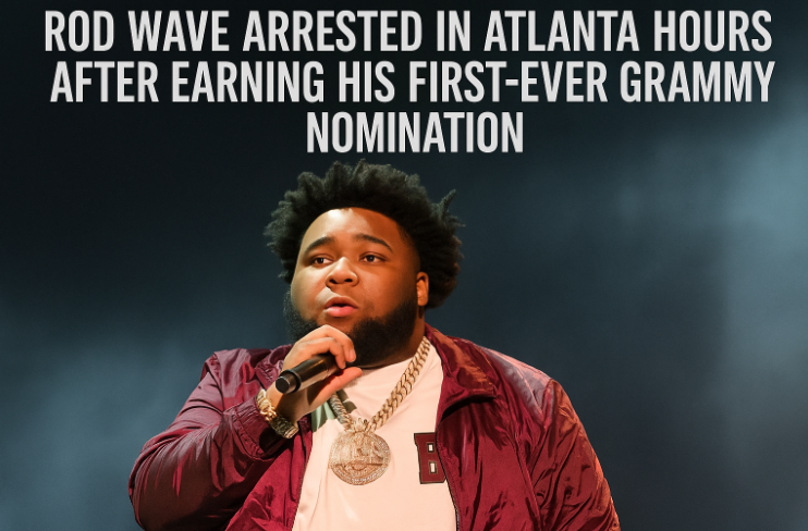 Rapper Rod Wave performing on stage in a burgundy jacket and gold chain, holding a microphone, with headline text above reading “Rod Wave Arrested in Atlanta Hours After Earning His First-Ever Grammy Nomination.”