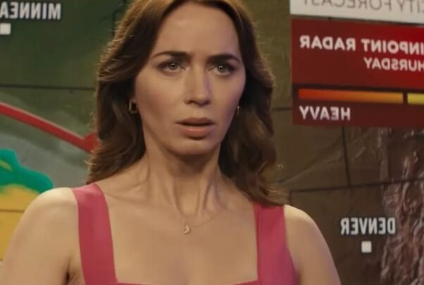 Emily Blunt appears during a weather broadcast in a tense scene from Steven Spielberg’s sci-fi film Disclosure Day